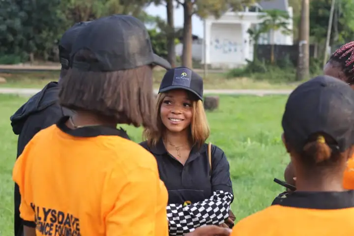 WillysDave volunteers in orange tees at the outreach ground