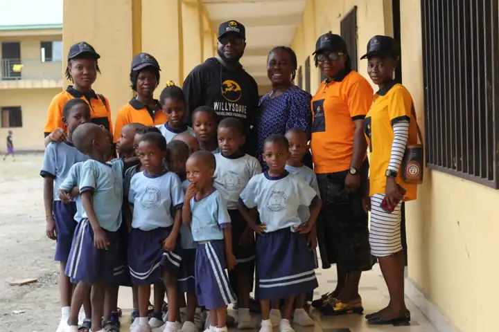 WillysDave team with pupils during a school outreach visit